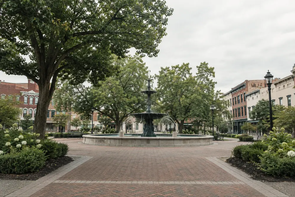 The fountain and shade trees of Fountain Square Park, Bowling Green