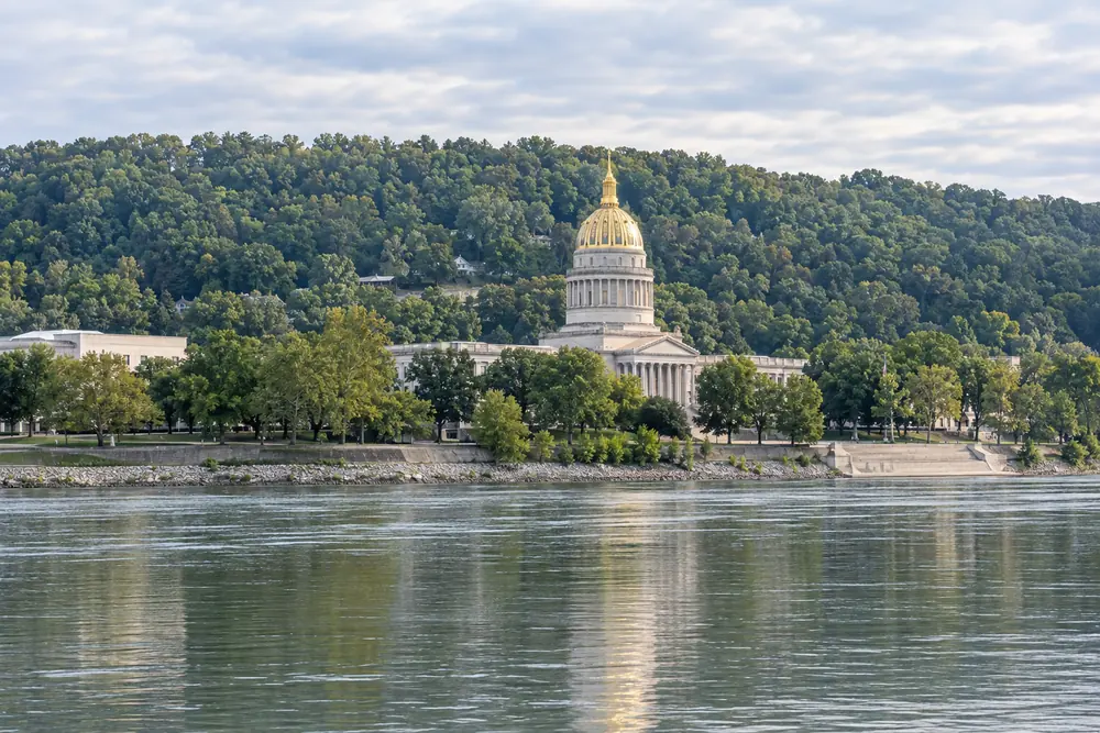 The gold dome of the West Virginia State Capitol above the Kanawha River